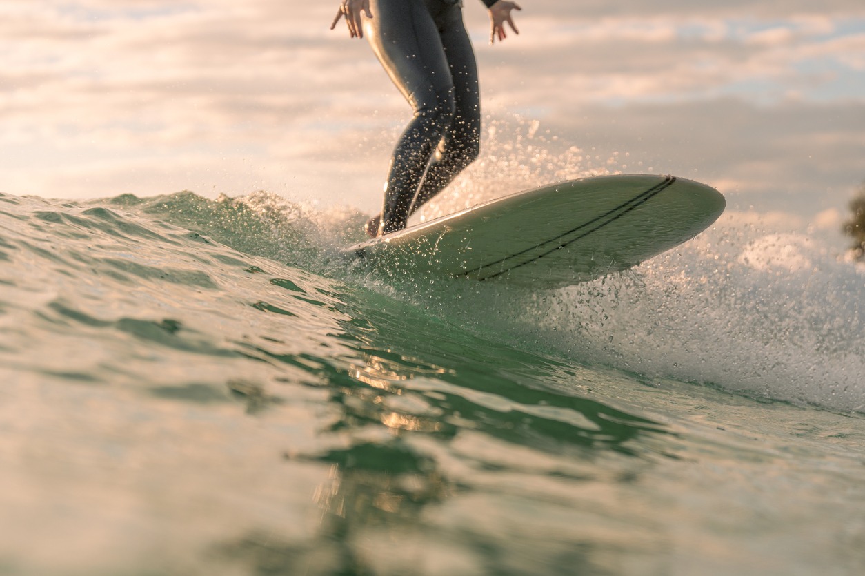 a person surfing the waves in Australia